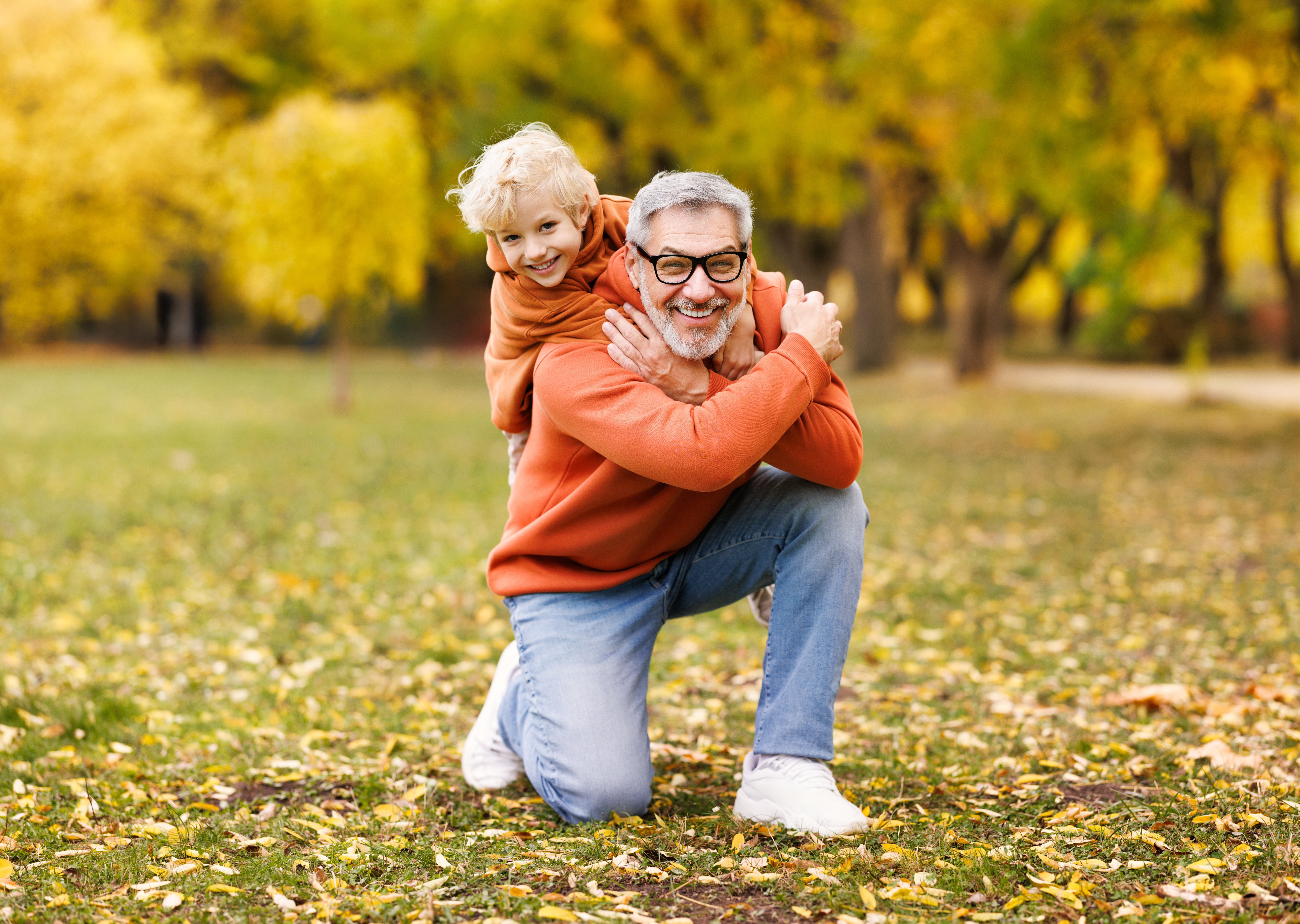 643641972 Father and son among fall colors