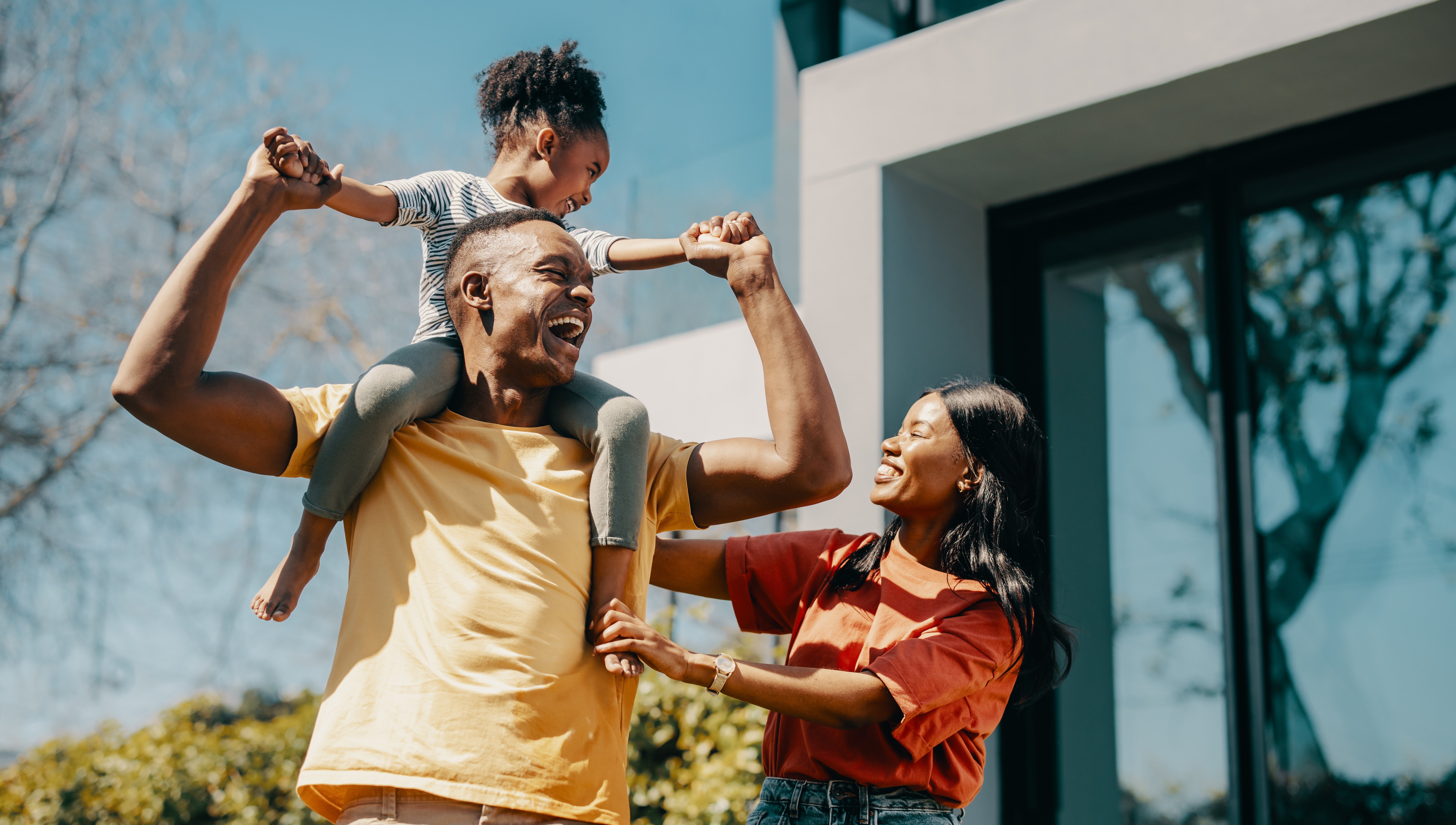 AdobeStock_606295800 Family fun time with mom and dad at home